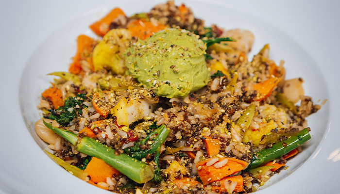 Quinoa bowl topped with locally sourced fresh ingredients, made famous by Juniper's in beautiful downtown Lanesboro